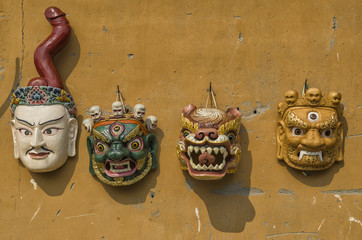 Famous bhutanese character masks - colorful mask from bhutanese religion characters