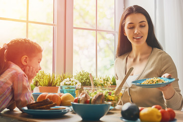 Wall Mural - family having dinner