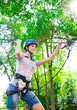 © davit85 - adventure climbing high wire park - people on course in mountain