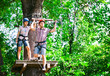 © davit85 - adventure climbing high wire park - people on course in mountain