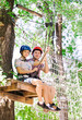 © davit85 - adventure climbing high wire park - people on course in mountain