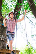 © davit85 - adventure climbing high wire park - people on course in mountain