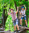 © davit85 - adventure climbing high wire park - people on course in mountain