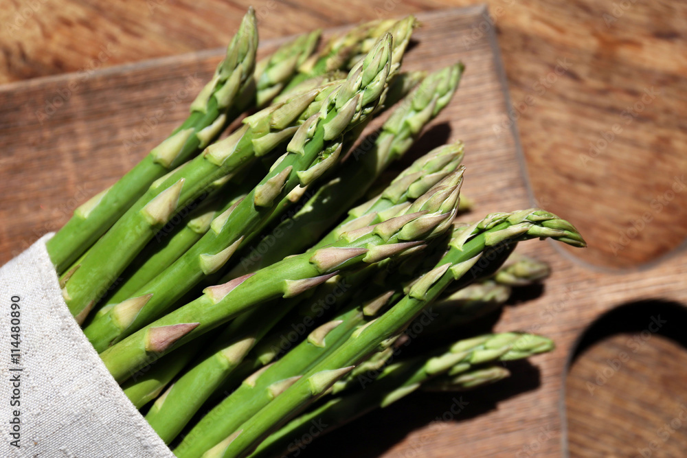 Asparagus on wooden table