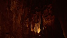 Video 1080p - Beautiful, Lighted Cavern With Dramatic Displays Of Stalactites And Natural Fountain Formations, Inhabited By A Colony Of Bats, With Sound.