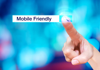 Wall Mural - finger touch on search button with search bar and mobile friendl