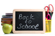 © Studio KIVI - wooden plaque with the inscription 'back to school' near the pencil box with school equipment and Apple with stack of books and notebooks on white background isolated