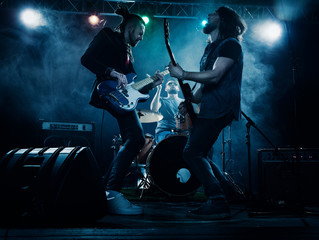 Canvas Print - Rock band performs on stage.