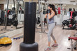 © sasamihajlovic - Girl punching bag workout