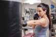 © sasamihajlovic - Girl focus on punching bag