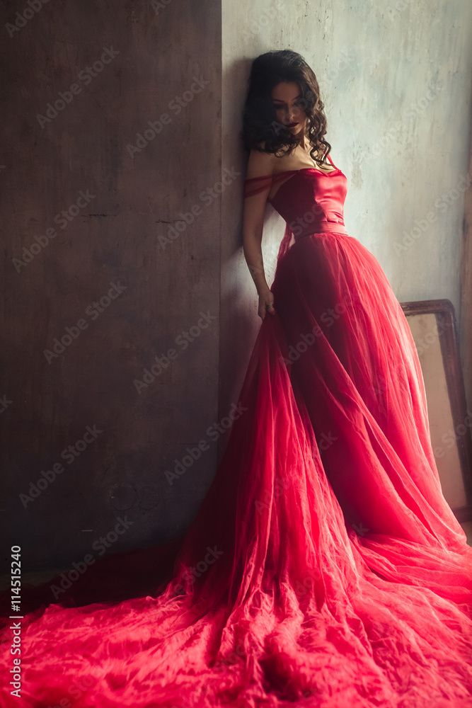 portrait of sensual woman in a long gorgeous red dress Stock Photo ...