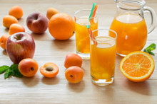 Apricot Peach Apple Orange Juice With Ice.