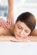 © WavebreakMediaMicro - Relaxed woman enjoying massage