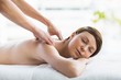 © WavebreakMediaMicro - Relaxed beautiful woman enjoying back massage