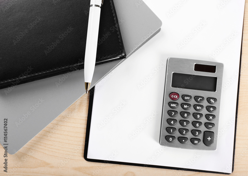 Office supply on wooden background