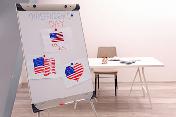 Canvas Print - Child's drawings of American flag on flip chart