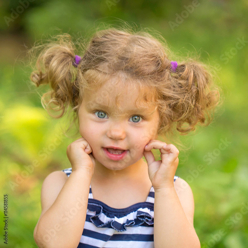 Cute Little Girl With Curly Blond Hair Buy This Stock Photo And