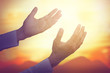 Hand of man pray for sky