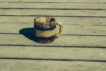 Wooden mug on the floor