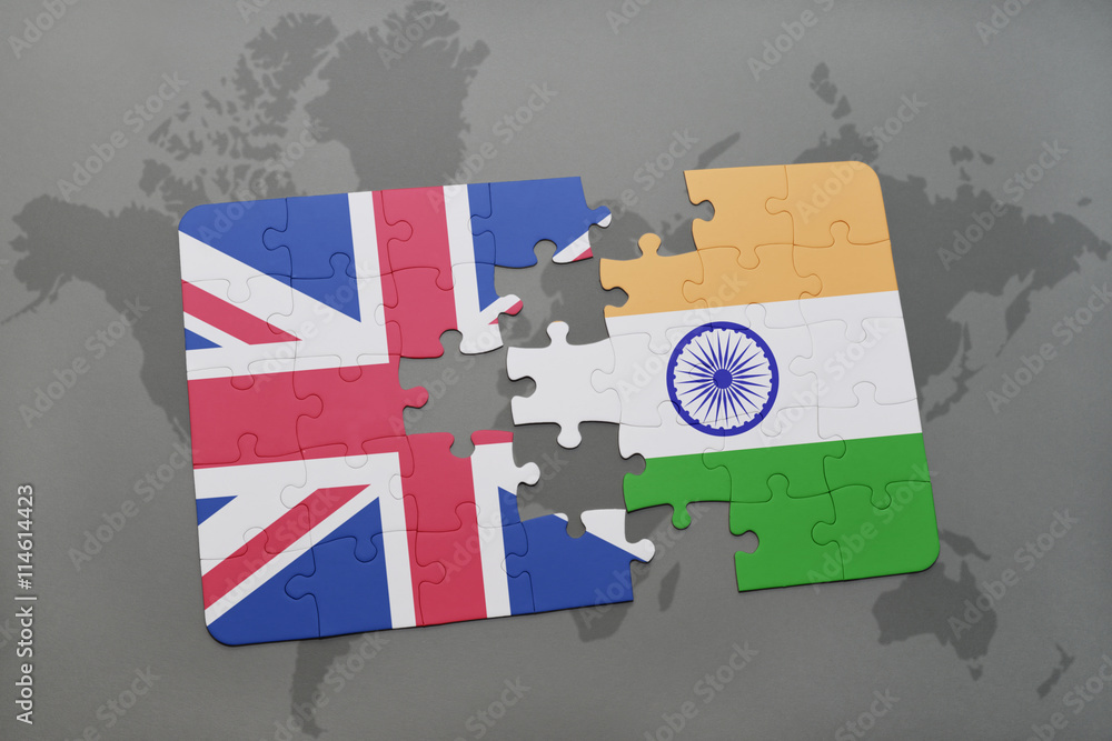 puzzle with the national flag of great britain and india on a world map ...