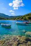 Fototapeta Na sufit - Fishing boats on turquoise sea in mountain landscape of Kefalonia island, Greece