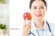 © PR Image Factory - Young asian nutritionist holding an apple