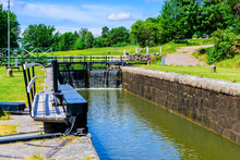 Narrow Canal With Closed Canal Lock At The End. Gota Canal In Sweden.
