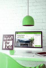 Wall Mural - green workspace with real estate on the computer