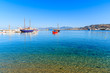 Boats on azure sea in Mykonos port, Cyclades, Greece