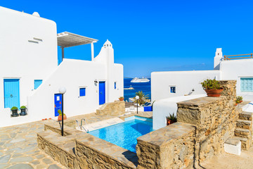 Wall Mural - MYKONOS ISLAND, GREECE - MAY 17, 2016: luxury holiday apartments with swimming pool in beautiful Mykonos town, Cyclades islands, Greece.