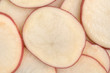 © Bert Folsom - Sliced red potatoes top close view.