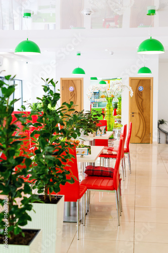 Modern Design Restaurant Interior In White And Red Colors