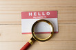 Blank name tag with magnifier glass
