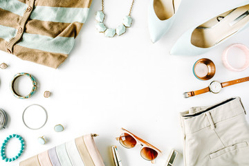 flat lay feminine clothes and accessories collage with cardigan, trousers, sunglasses, watch, bracel