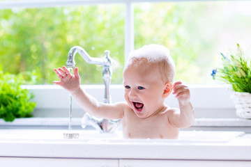 little baby taking bath