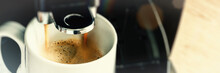 Close Up Of Coffee Maker Machine Pouring Brewed Hot Espresso