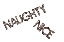 The Words "Naughty" And "Nice" On A Bhite Background.
Christmas Theme