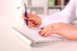 © lenetsnikolai - Young businesswoman working on a laptop