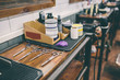 © estradaanton - Shaving and haircuts accessories in a barber shop