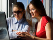 © Dmitry Bairachnyi - two women with laptop
