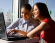 © Dmitry Bairachnyi - two women with laptop