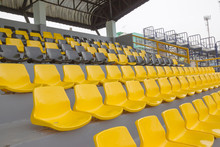 Empty Chairs And Walkway In Football Stadium