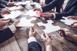 © alotofpeople - Business people and puzzle