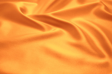 Wall Mural - orange satin fabric as background
