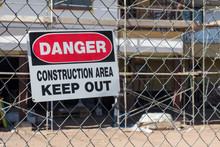 Danger Construction Area Keep Out Sign In Front Of Building Under Construction