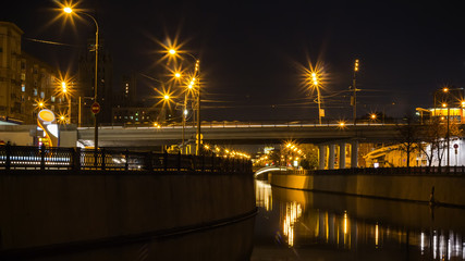 Wall Mural - embankment,  reflection in water , motion night scene