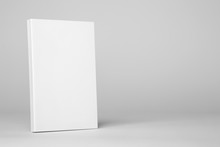 Real Paperback White Book On A Gray Background