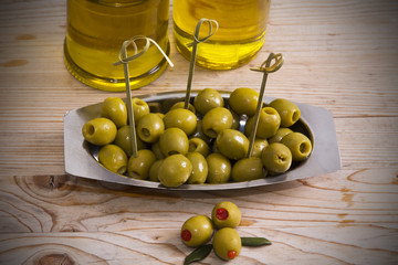 stuffed olives on wooden background