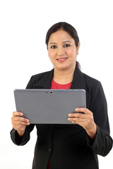 Canvas Print - Young business woman using tablet computer