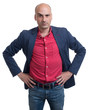 © spaxiax - skeptical bald man looking at camera. Isolated
